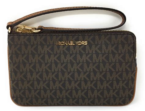 michael kors vanila large wristlet|Michael Kors clutch handbags.